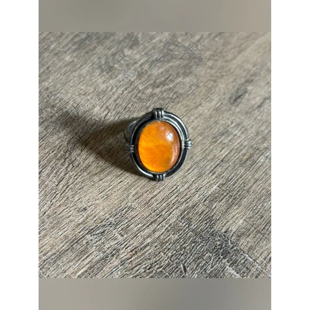 Untested women’s size 13.5 metal butterscotch amber or orange spiny oyster ring
